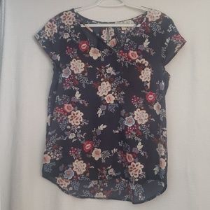 Blue floral top with criss cross front